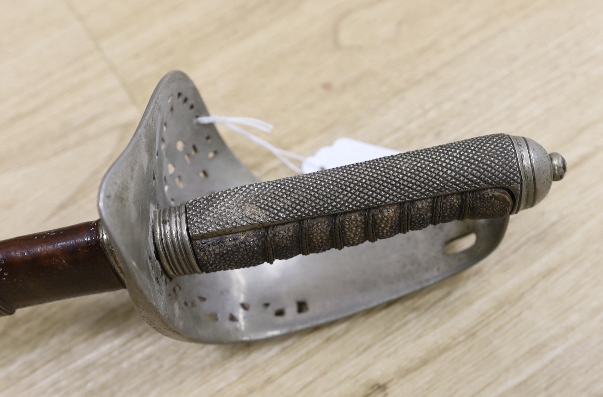 A George V officer's dress sword by Army & Navy Stores Ltd., blade 83cm, within leather scabbard